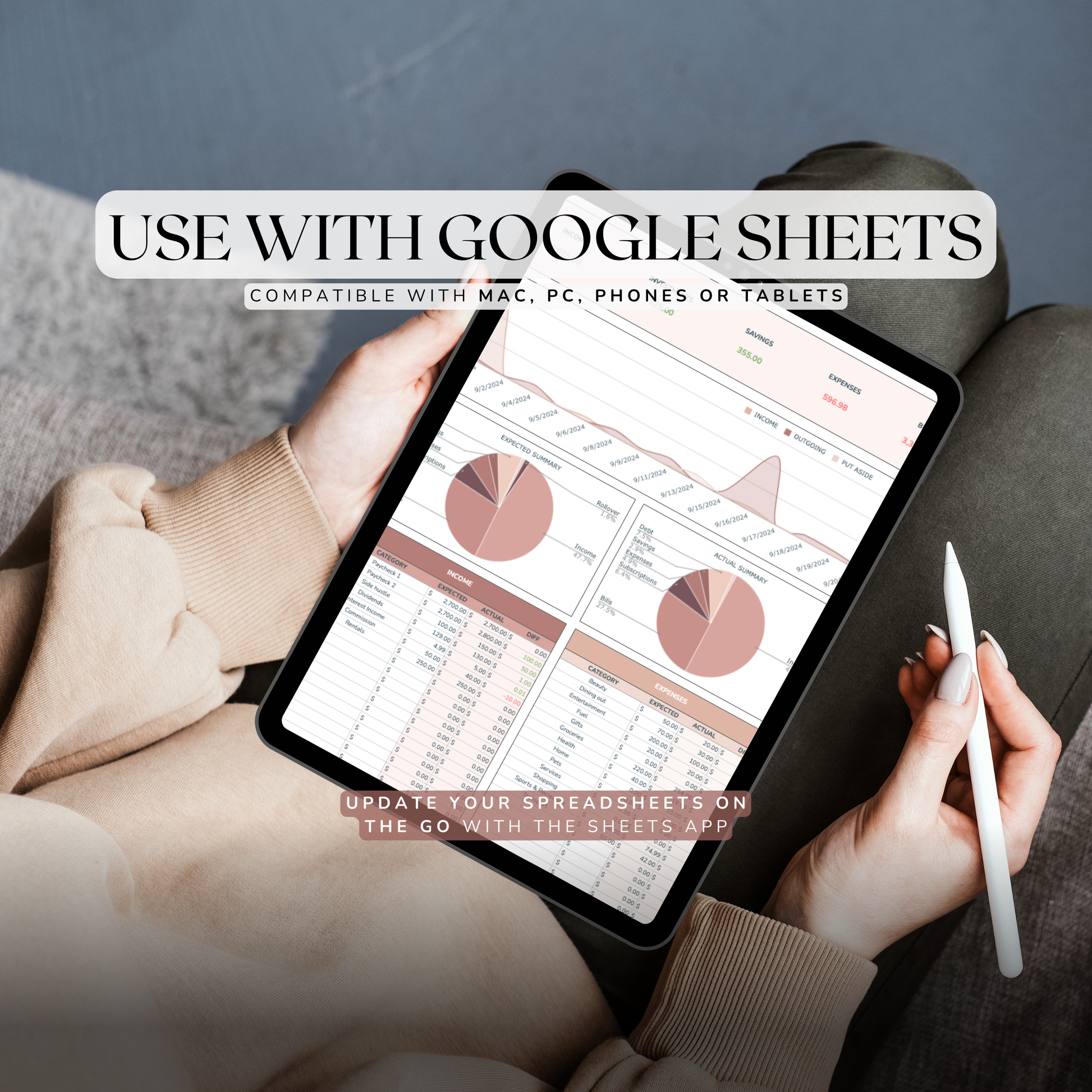Person holding a tablet with Google Sheets monthly budget spreadsheet open, sitting on a couch.